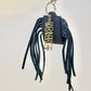 Charme de sac Bachkootoo en cuir Noir
