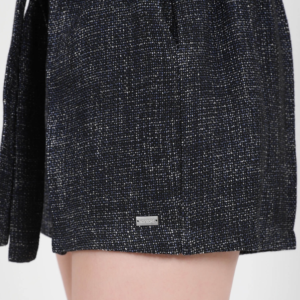 Short femme avec poche côté en Tweed